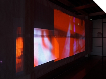 Holly Rowan Hesson, Echo (partial view), 2017, projection (looped series of 140 stills for each of six projectors), scaffold sheet, steel structure, webbing, lighting gels, dimensions variable (image credit: Jules Lister) Holly Rowan Hesson, Echo (partial view), 2017, projection (looped series of 140 stills for each of six projectors), scaffold sheet, steel structure, webbing, lighting gels, dimensions variable (image credit: Jules Lister)