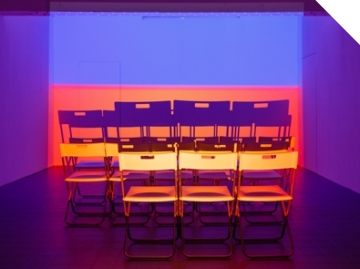 Holly Rowan Hesson, Assembly, 2016, projection (looped series of 147 stills for each of three projectors), chairs, dimensions variable Photo credit: Jules Lister Holly Rowan Hesson, Assembly, 2016, projection (looped series of 147 stills for each of three projectors), chairs, dimensions variable Photo credit: Jules Lister